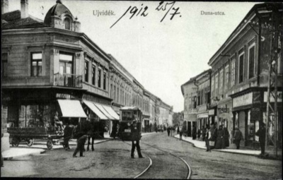Duna Street, with a cart and the tram, Dunavska Street, Novi Sad, by July 1912