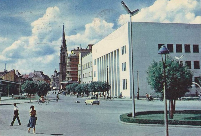 In colour, with a yellow car, Palace of trade, Novi Sad, 1959