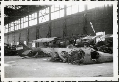 Wrecked biplanes inside a bombed hangar at the Novi Sad airfield, 1941