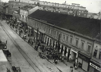 Elevated View of a Novi Sad Shopping Street, an Awning Lettered for a Hotel, Hotel Queen Mary, 1941-1944