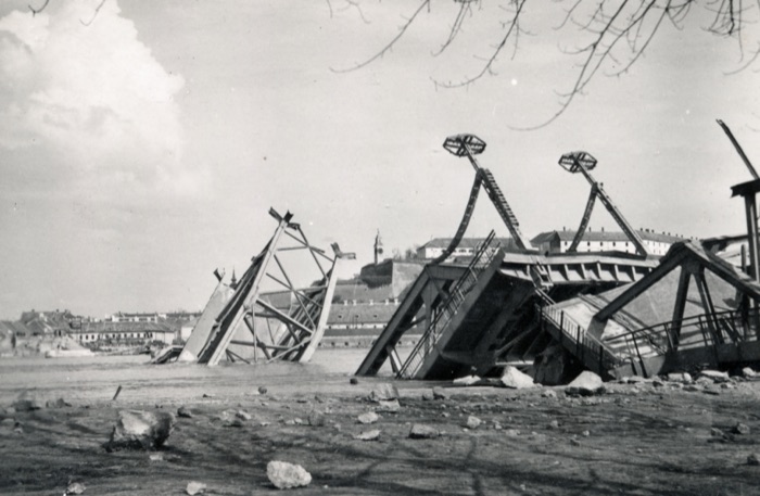 Remains of the destroyed road bridge, with Petrovaradin behind, Prince Tomislav Bridge, Novi Sad, 1941