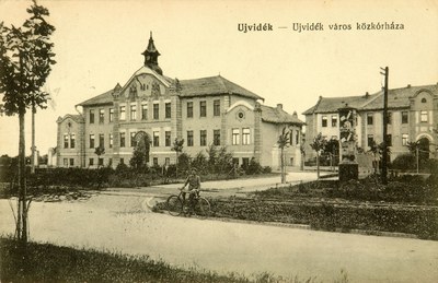 A cyclist on the hospital drive, City Public Hospital, Novi Sad, 1915