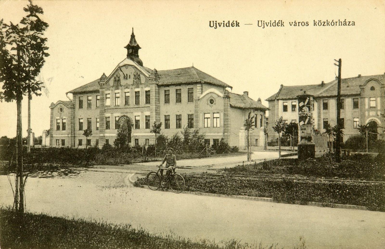 A cyclist on the hospital drive, City Public Hospital, Novi Sad, 1915