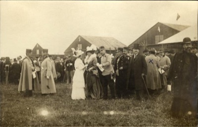 A Woman in White Beside Archduke Joseph at the Hangars, Novi Sad, Novi Sad Airfield, 12 May 1913