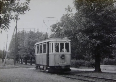 A tram on the reserved track under the trees, Futoški Park, Novi Sad, 1911–1958