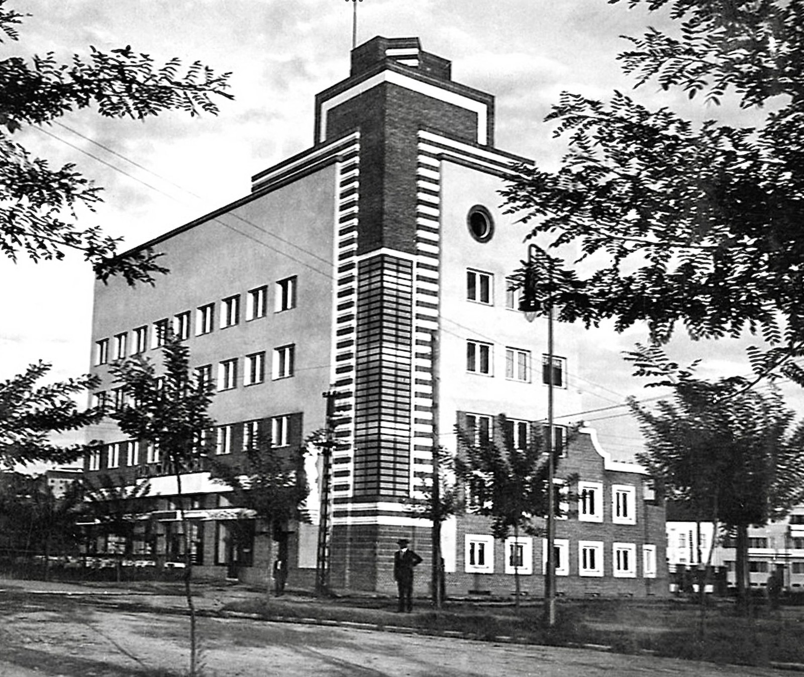 Modernist block with a brick tower, Novi Sad, 1935–1950