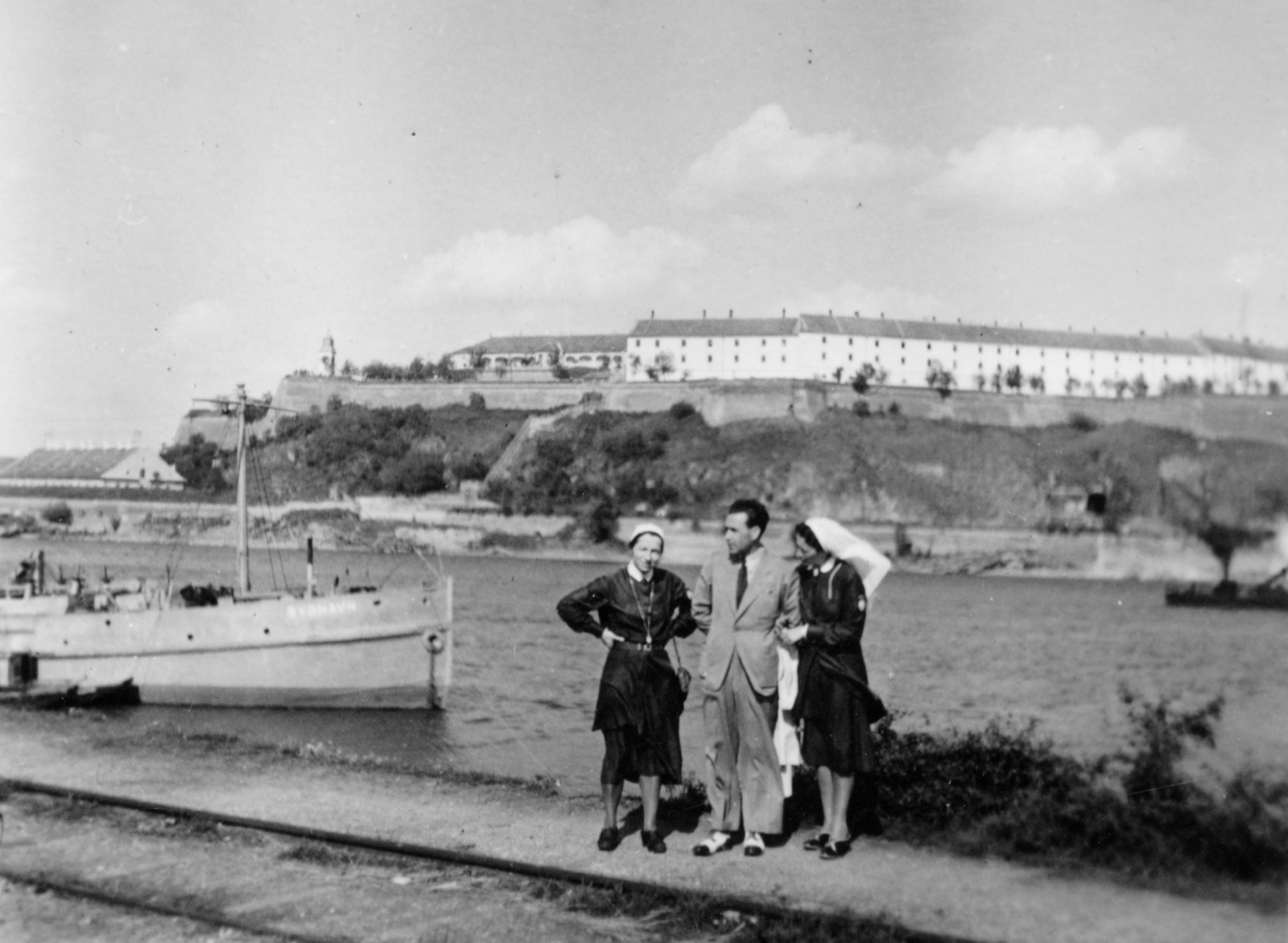 Visitors by the boat Sydhavn, below Petrovaradin fortress, 1941