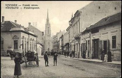A woman with a basket on her back, Futak street, Novi Sad, 1900s